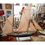Fine hand built model of a sailing Brixham trawler with keel and motor driven rudder, 43" overall