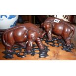 19th c. Chinese carved wooden elephants on hardwood stands