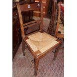 Set of six 19th c. oak rush-seated dining chairs