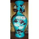 19th c. Chinese type turquoise glazed vase with floral relief decoration, 25cm