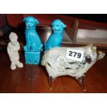 End of day glass pig, pair of blue Chinese dogs and an unusual small Parian ware figure of a man (