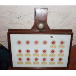 Early 20th c. electric servants bell board in mahogany case