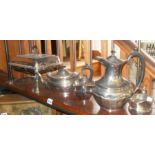 Edwardian silver-plated food warmer on stand and a four piece silver plated tea and coffee set