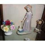 Lladro figurine of a girl with dolly in cart, a Waterford crystal 'grandfather clock' and an Aynsley