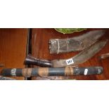 Nepalese kukri in scabbard and a native wooden blowdart quiver