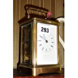 Brass carriage clock with Swiss repeating movement, striking on a bell by Capt Henry Daniel, working