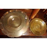 Chinese metalware - engraved brass trays, dishes and alms dish