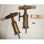 Thomason type barrel corkscrew, a King's screw rack and pinion corkscrew and a bone corkscrew