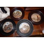 Four Prattware pot lids in wood frames