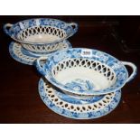 Pair of Victorian blue and white lattice ware baskets with matching saucers under