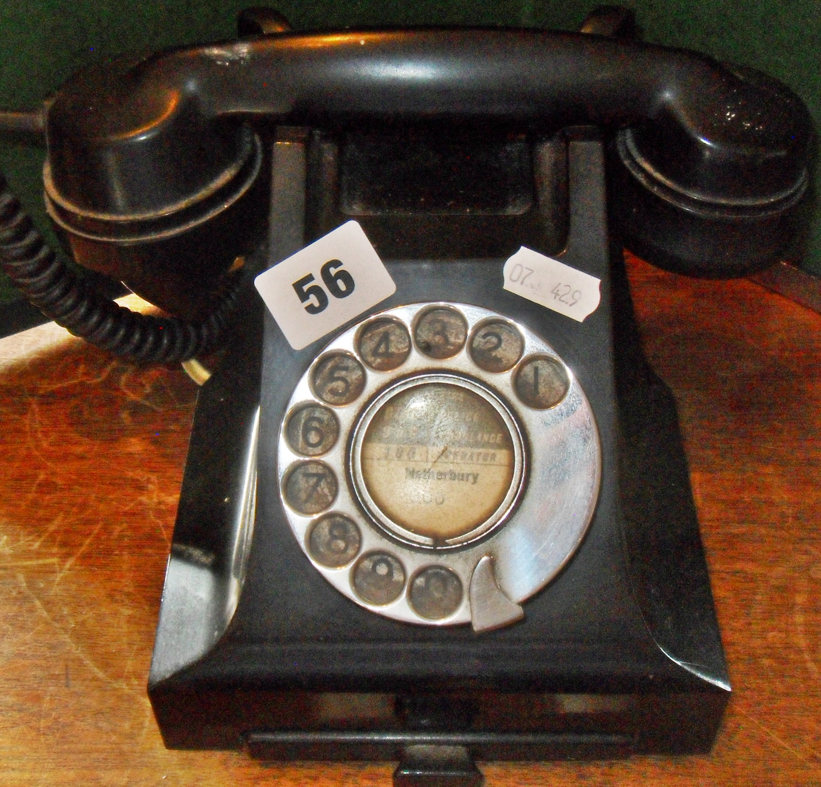 Old black bakelite telephone with Netherbury exchange