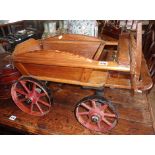 An F.H. Ayres pull-along child's four wheel farm cart