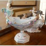Continental porcelain boat shaped figural centrepiece tazza and a similar bowl (A/F)