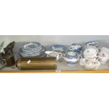 Assorted blue and white tea ware, a blow lamp, and brass muff warmer flask