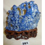 Early Chinese Republic lapis lazuli figural carving with large carp, on pierced wooden stand