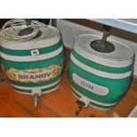 Two Victorian ceramic spirit kegs or barrels with gilt legends, BRANDY and GIN, converted to table