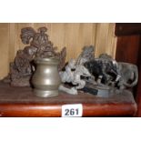 Early 19th c. spelter, iron and lead ornaments, inc. lions, horses, etc., and inc. a pewter measure