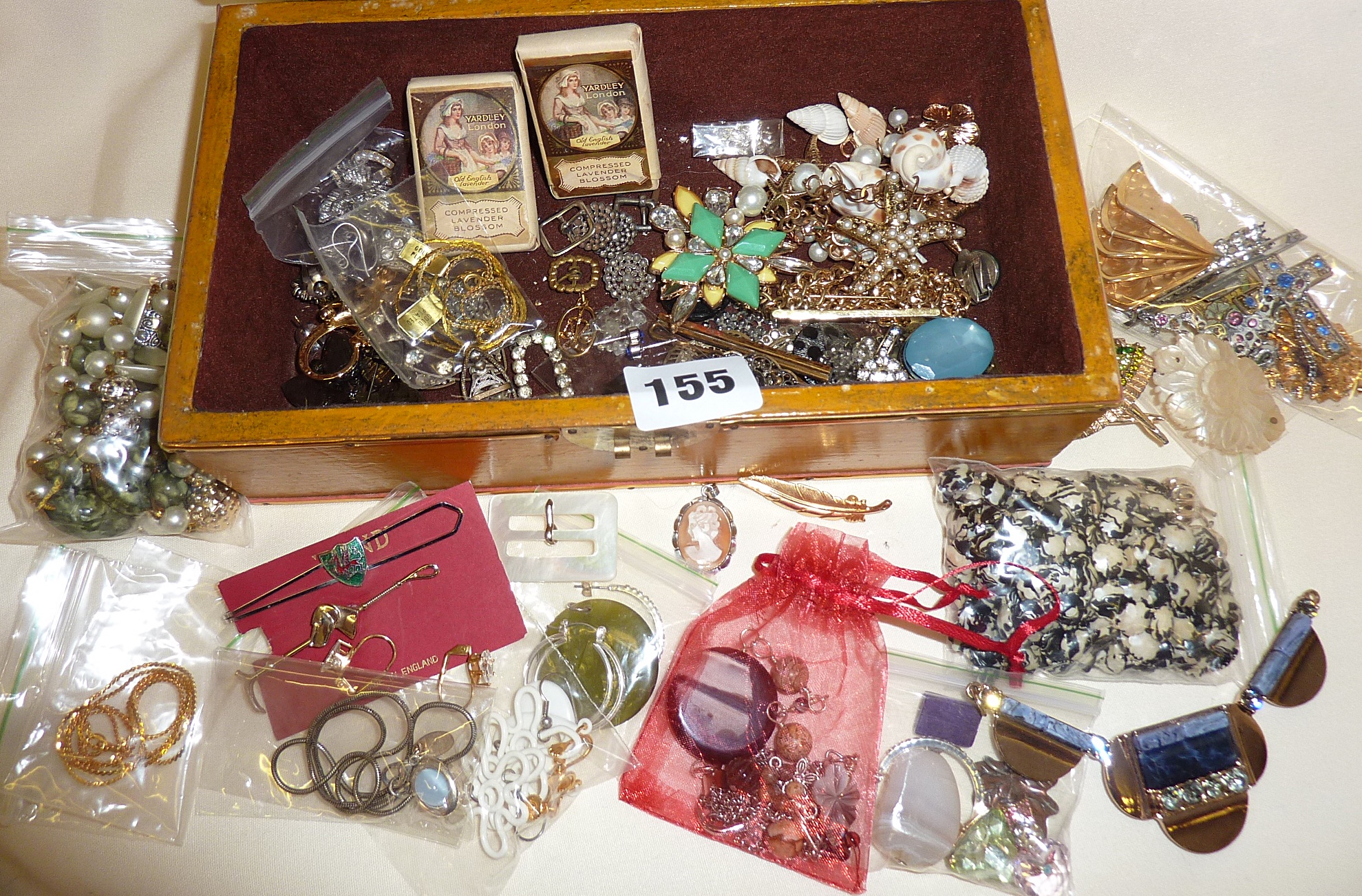 Jewellery box containing vintage jewellery necklaces, brooches, earrings, etc.