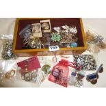 Jewellery box containing vintage jewellery necklaces, brooches, earrings, etc.