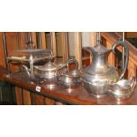 Edwardian silver plated food warmer on stand and a four piece silver plated tea and coffee set