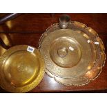 Chinese metalware - engraved brass trays, dishes and alms dish