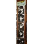 Collection of eight 1960s Brel Beatles photo cards on original Churchfield supplies shop display