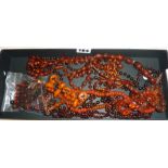 Collection of possibly amber bakelite and amber type jewellery, consisting of necklaces and beads