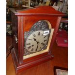 Mahogany cased mantle clock with arch topped dial, the movement chiming on a gong