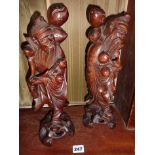 Two Chinese carved hardwood figures