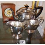 Silver plated tea set, c. 1920 and a small wooden cased mantle clock