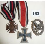 WW1 & WW2 German badges & medals, a radio operator's badge, WW1 Honour Cross and an Iron Cross