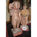Two old Chinese carved softwood figures of peasants, possibly tomb figures