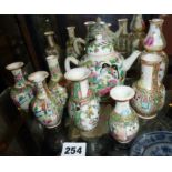 Seven Chinese Canton miniature vases & a similar teapot