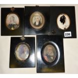 Framed miniature portraits and a silhouette portrait