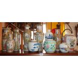 Shelf of Chinese porcelain including Canton vases, ginger jars and other vases