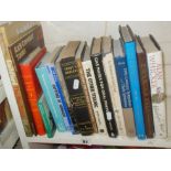 Shelf of military-related books