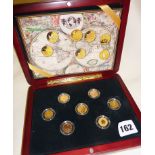 Cased set of seven 1/10th oz. gold coins from around the world, dated from 2000, approx 15.5g with