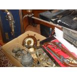 Box of assorted metalware, Kitsch reproduction duelling pistols etc