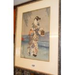 Japanese colour woodblock print of a Geisha with a picnic box, signed character marks, possibly