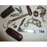 Pen knives, military spring balance scale, silver fob chains (approx 1.6 troy oz)