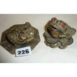 Two Chinese bronze grotesque toad paperweights