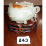 Chinese carved jade water pot on hardwood stand