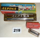 Vintage Alpina German Harmonica in box, and a miniature Hohner harmonica in Box