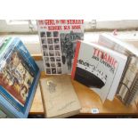 Shelf of transport-related books, including the "Bedside Bus Book", and an 1893 First Edition "