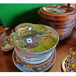 Large collection of "Norman Rockwell" wall plates, and a quantity of similar plates