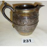 Silver cream jug decorated with heraldic emblems, hallmarked for Glasgow 1877 - George Edward & Son