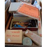 Assorted books on Needlework, a wooden weaving shuttle and accessories