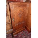 Late 19th c. pine cupboard with decorative carved flower motif