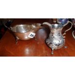 Silver sauce boat, Birmingham 1909 and a Georgian silver cream jug (A/F)