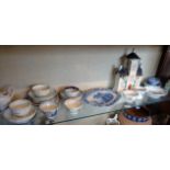 Large collection of 18th and 19th c. English porcelain tea bowls, Staffordshire cottage, blue and